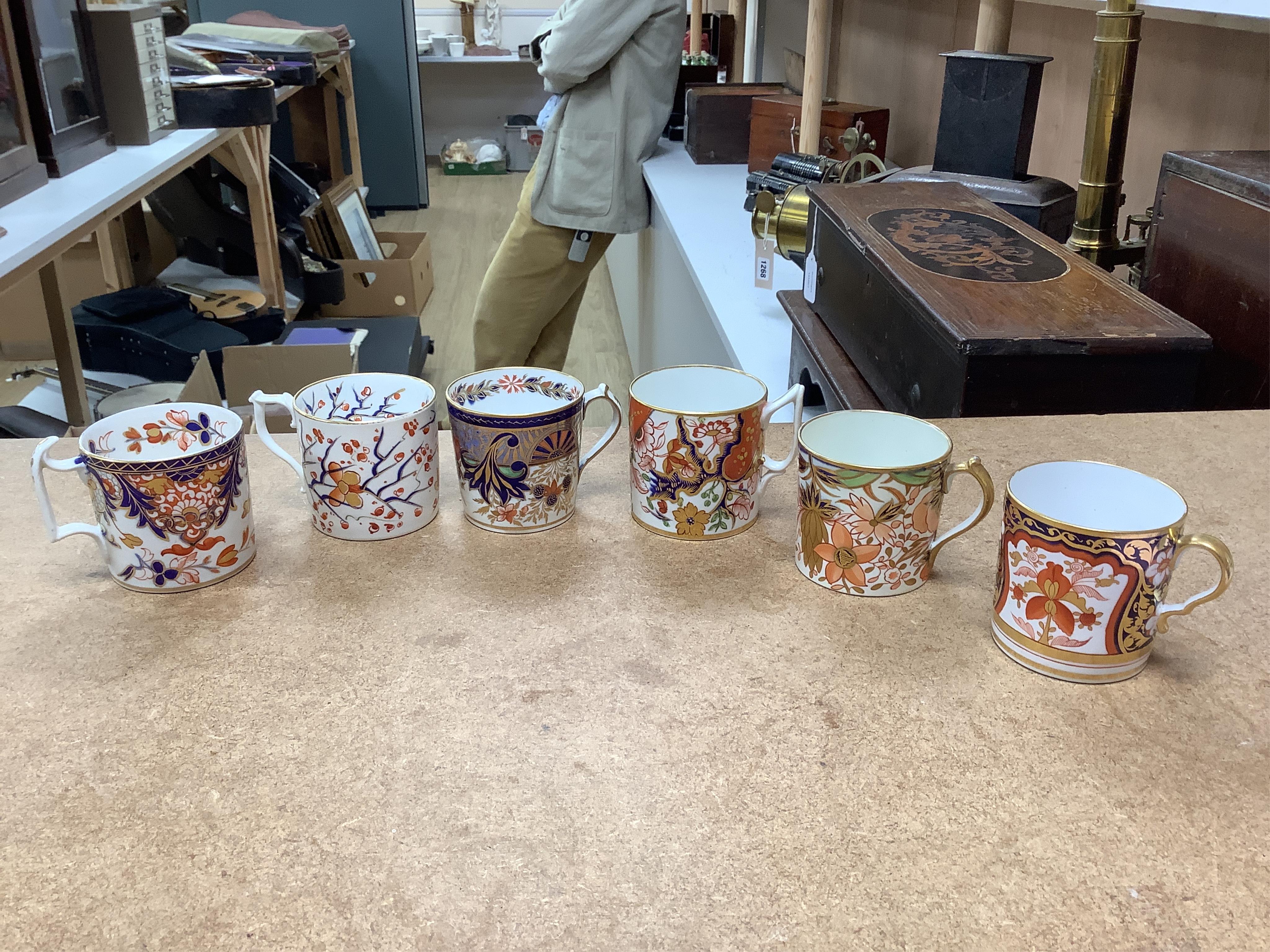 Twelve 1800-1820 English Imari patterned coffee cans